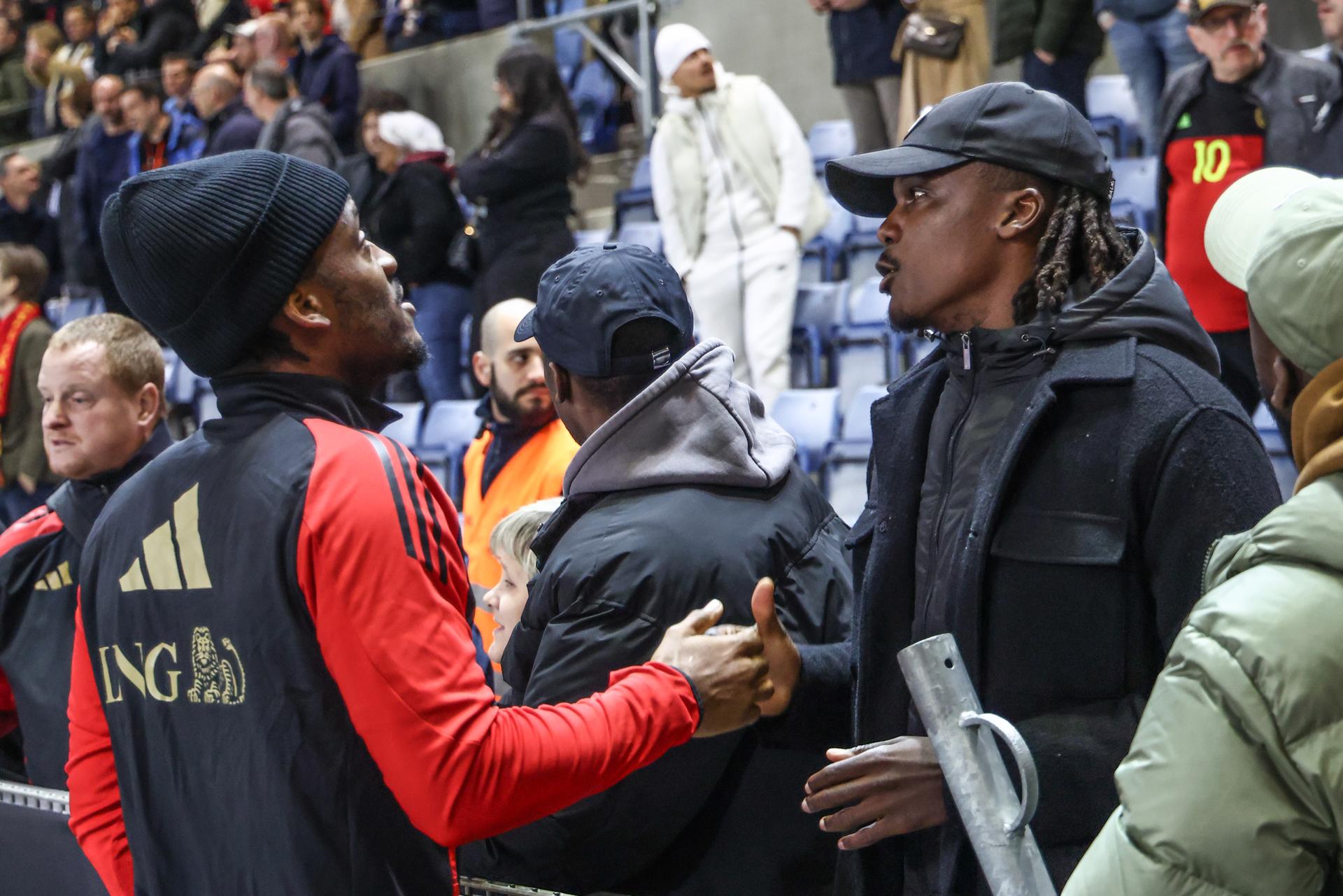 Belgium's Michy Batshuayi and Belgium's Dedryck Boyata pictured after a soccer game between Belgian national team the Red Devils and Ukraine, Sunday 23 March 2025 in Genk, the return leg of the Nations League playoff. Ukraine won the first leg 3-1. BELGA PHOTO BRUNO FAHY