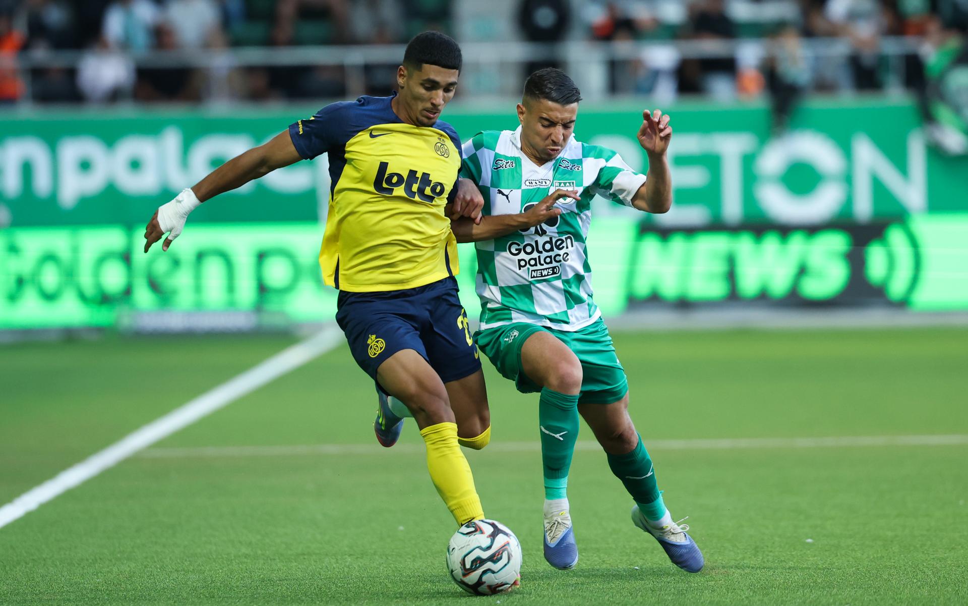 Union's Anan Khalaili and RAAL's Sami Lahssaini fight for the ball during a soccer match between RAAL La Louviere and Royale Union Saint-Gilloise, Sunday 24 August 2025 in La Louviere, on day 5 of the 2025-2026 'Jupiler Pro League' first division of the Belgian championship. BELGA PHOTO VIRGINIE LEFOUR
