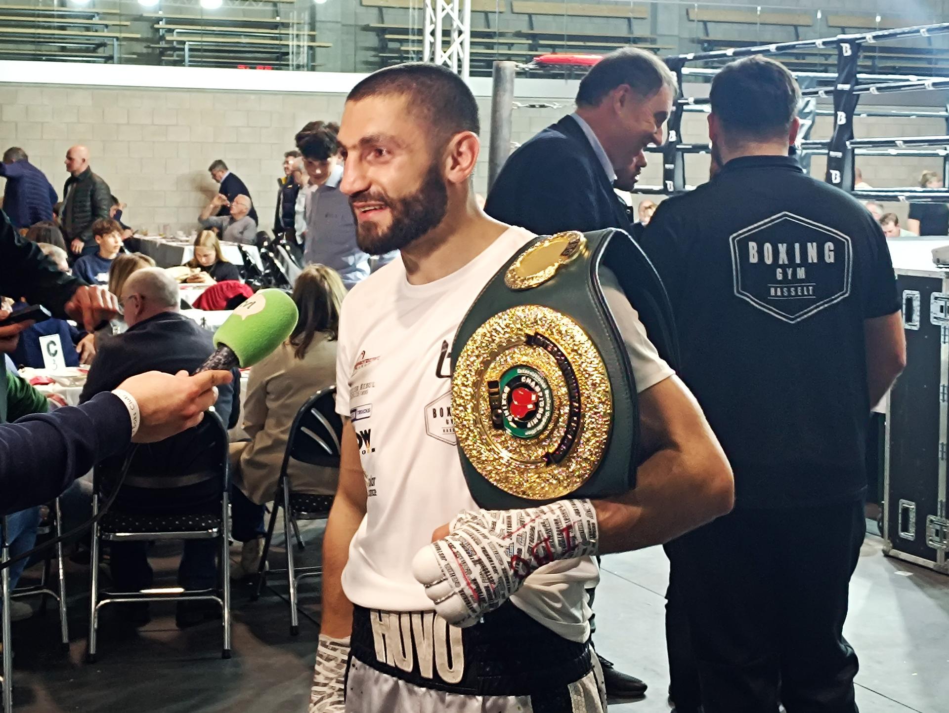 Belgian Hovo Martirosyan celebrates after winning the Intercontinental IBO title in the super-welterweights category during a fight at the Truiense Boksgala, in Sint-Truiden, Saturday 29 March 2025. BELGA PHOTO BERNARD CERF