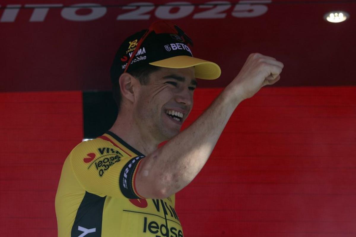 Team Visma-Lease a Bike's Belgian rider Wout Van Aert celebrates on the podium after winning the 9th stage of the 108th Giro d'Italia cycling race of 181kms from Gubbio to Siena on May 18, 2025.  Luca Bettini / AFP
