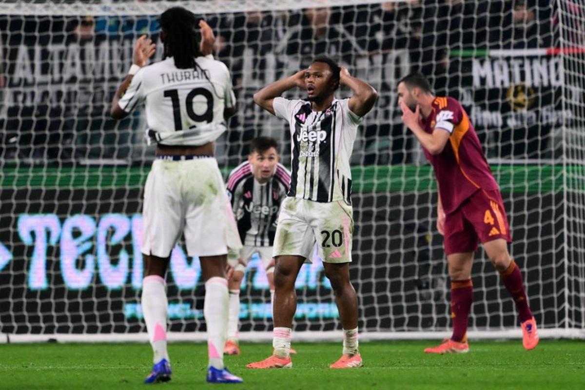 Juventus' Belgian forward #20 Lois Openda (C) reacts during the Italian Serie A football match between Juventus and AS Roma at the Allianz stadium in Turin, northern Italy, on December 20, 2025.  MARCO BERTORELLO / AFP