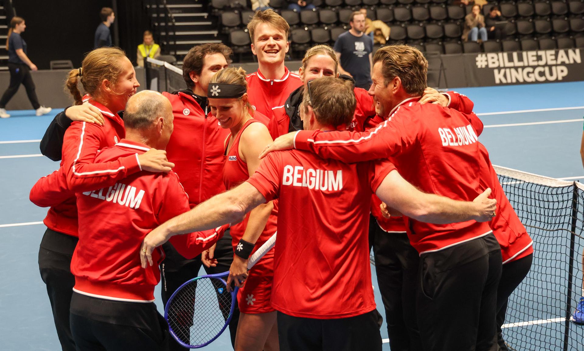 belgian players celebrate after winning a tennis match between Belgian Minnen and French Gracheva, on Friday 11 April 2025, the second game in the Promotion Play-offs between Belgium and France in the Europe/Africa Group I of the Billie Jean King Cup tennis, in Vilnius, Lithuania. PHOTO VIRGINIE LEFOUR