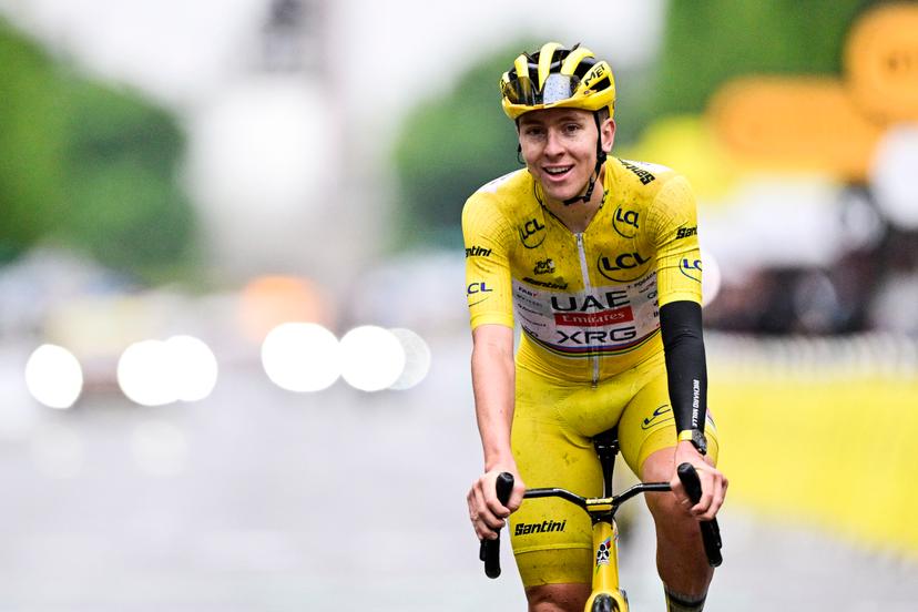 Slovenian Tadej Pogacar of UAE Team Emirates crosses the finish line at stage 21 of the 2025 Tour de France cycling race, from Mantes-la-Ville to Paris (120km), on Sunday 27 July 2025 in France. The 112th edition of the Tour de France starts on Saturday 5 July in Lille, France, and will finish in Paris, France on the 27th of July. BELGA PHOTO DIRK WAEM
