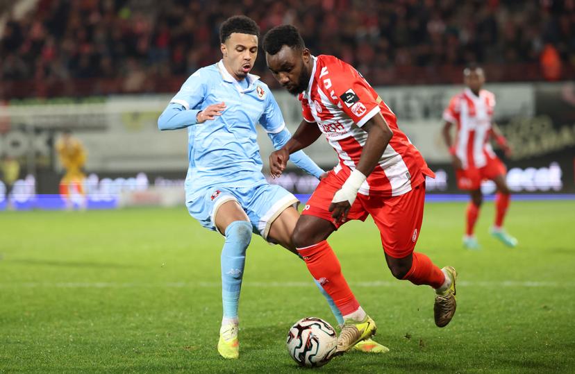 Seraing's Emmanuel Da Costa and Kortrijk's Thierry Ambrose fight for the ball during a soccer game between KV Kortrijk and RFC Seraing, Saturday 13 December 2025 in Kortrijk, on day 17 of the 2025-2026 'Challenger Pro League' 1B second division of the Belgian championship. BELGA PHOTO VIRGINIE LEFOUR