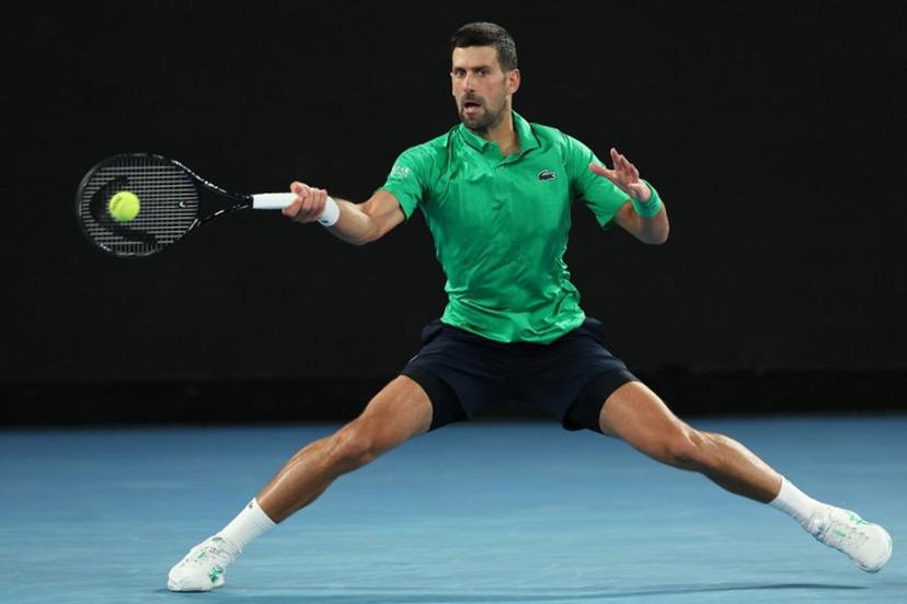 Serbia's Novak Djokovic hits a return to Netherlands' Botic van de Zandschulp during their men's singles match on day seven of the Australian Open tennis tournament in Melbourne on January 24, 2026.  Martin KEEP / AFP