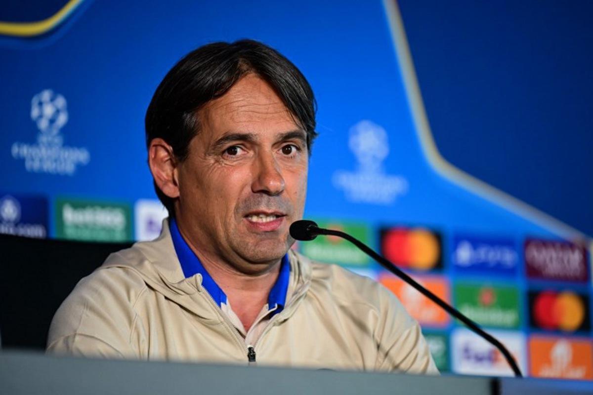 Inter Milan's Italian coach Simone Inzaghi gives a press conference ahead of the UEFA Champions League final football match against Paris Saint-Germain (PSG) as part of the club's media day in Appiano Gentile, Italy, on May 26, 2025.  Piero CRUCIATTI / AFP