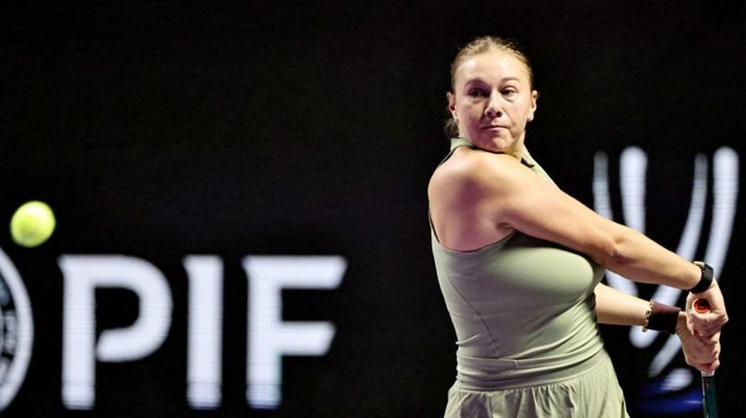 US' Amanda Anisimova returns the ball to US' Madison Keys during their tennis match at the WTA Finals in Riyadh on November 3, 2025.  Fayez NURELDINE / AFP