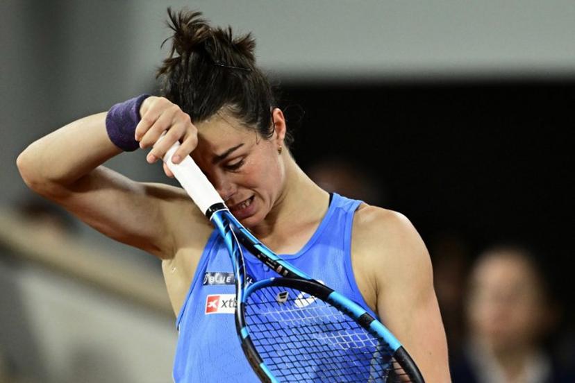 France's Lois Boisson reacts during her women's singles semi-final match against US Coco Gauff on day 12 of the French Open tennis tournament on Court Philippe-Chatrier at the Roland-Garros Complex in Paris on June 5, 2025.  JULIEN DE ROSA / AFP