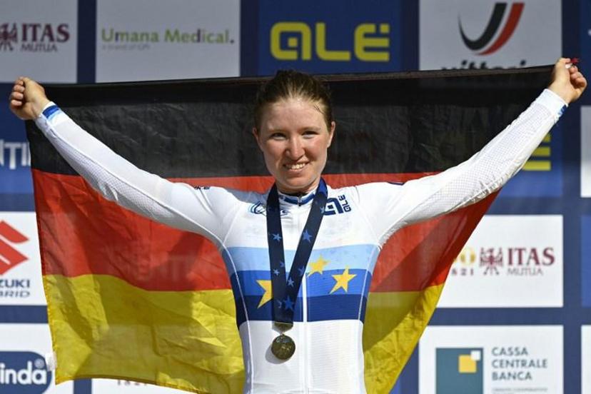 German cyclist Linda Riedmann celebrates on the podium after zinning the UEC European women junior road cycling championships in Trento on September 10, 2021.   Alberto PIZZOLI / AFP
