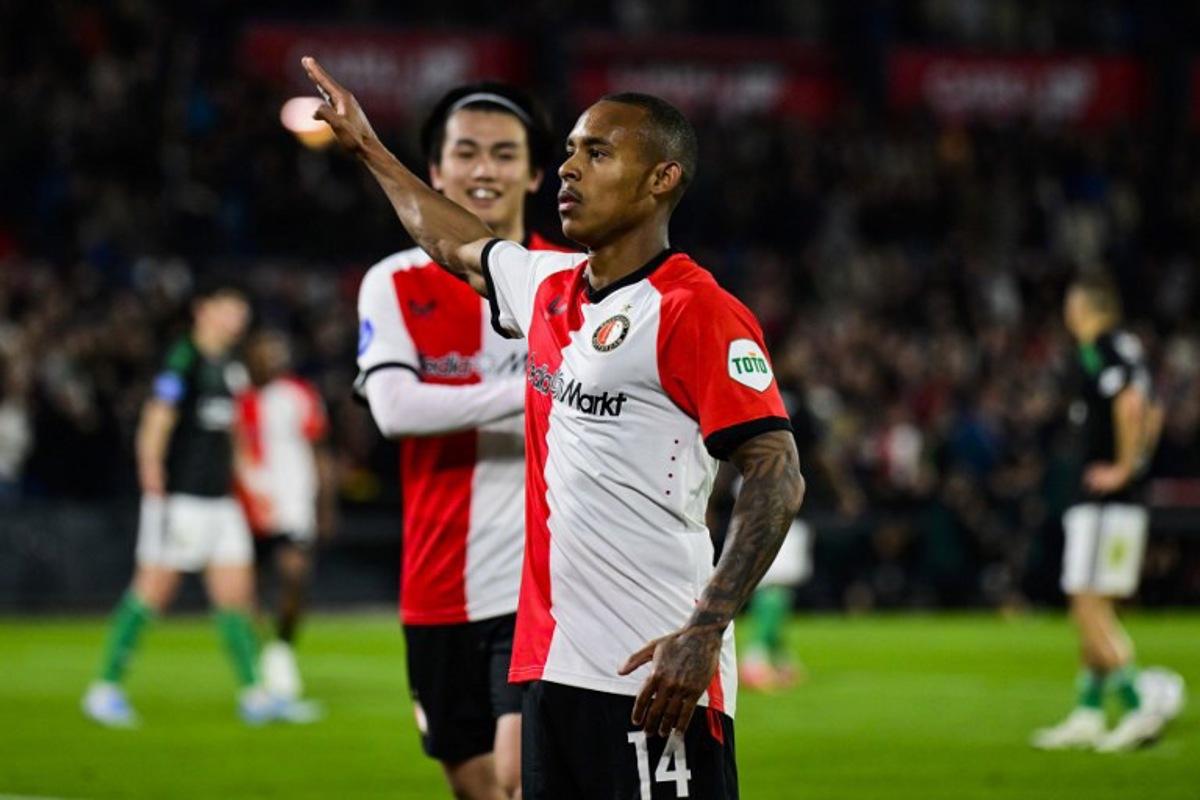 Feyenoord's Brazilian forward #14 Igor Paixao reacts after scoring a goal during the Dutch Eredivisie football match between Feyenoord and PEC Zwolle at Feyenoord Stadium de Kuip in Rotterdam on April 25, 2025.  Olaf Kraak / ANP / AFP