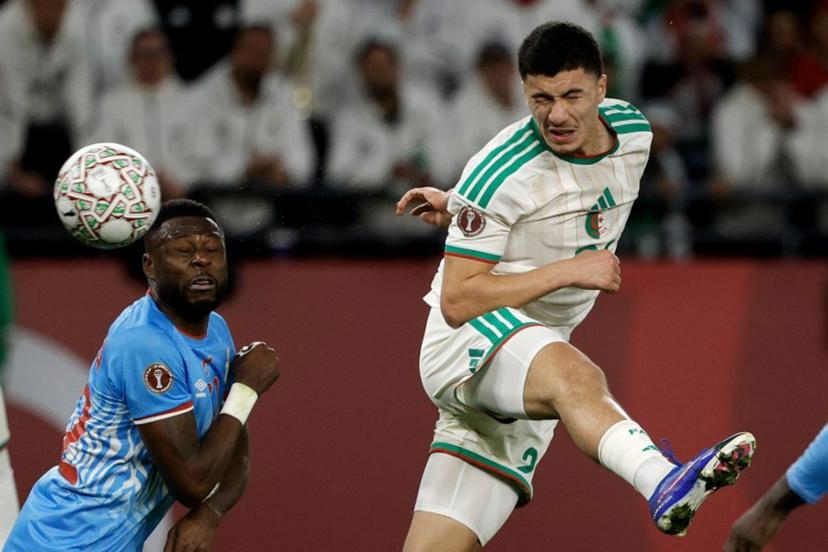 Algeria's midfielder #22 Ibrahim Maza heads the ball during the Africa Cup of Nations (CAN) round of 16 football match between Algeria and Democratic Republic of Congo at the Prince Moulay El Hassan Stadium in Rabat on January 6, 2026.   Abdel Majid BZIOUAT / AFP