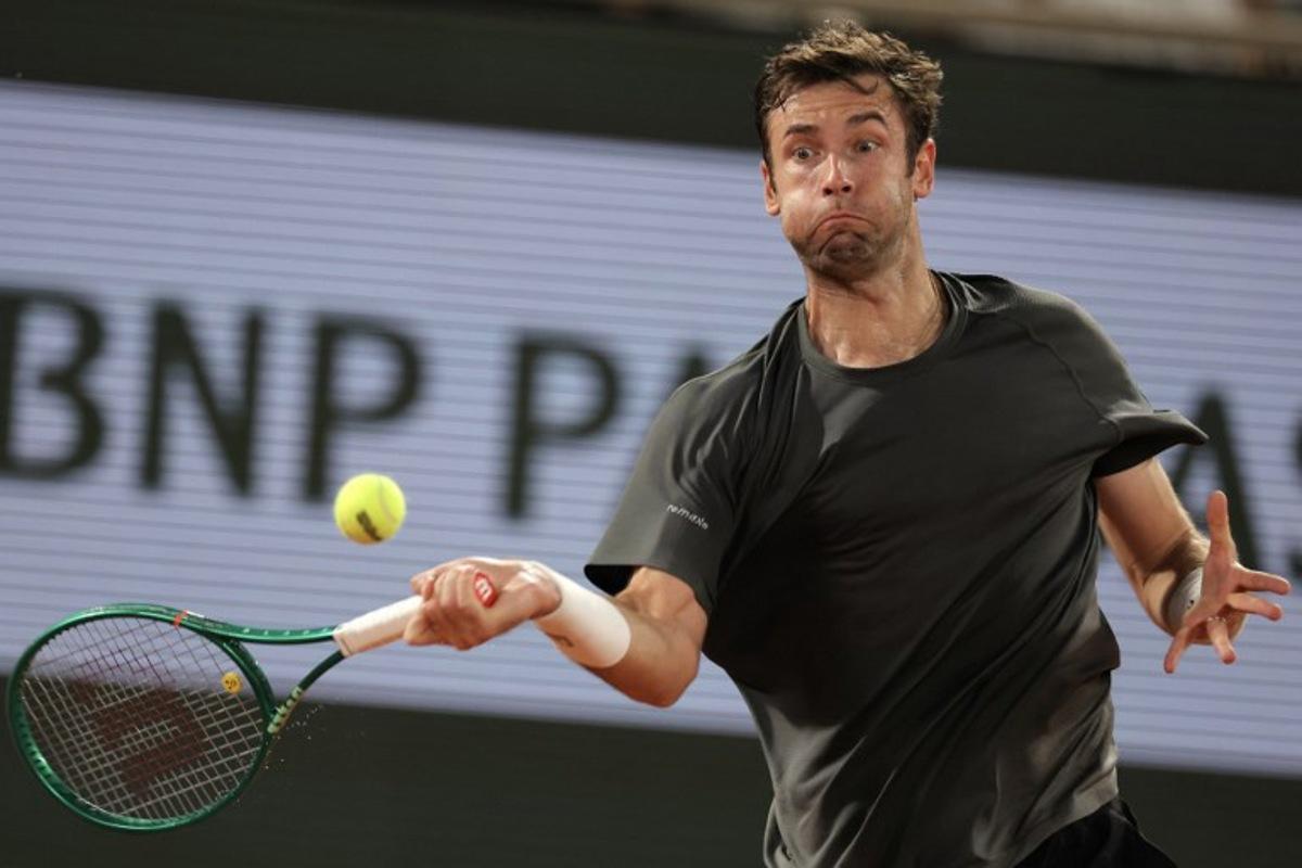 France's Quentin Halys plays a forehand return to Germany's Alexander Zverev during their men's singles match on day 6 of the French Open tennis tournament on Court Philippe-Chatrier at the Roland-Garros Complex in Paris on May 29, 2026.  Thomas SAMSON / AFP