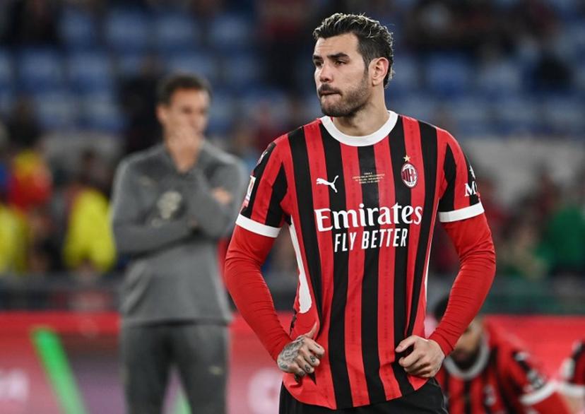 AC Milan's French defender #19 Theo Hernandez reacts at the end of the Italian Cup (Coppa Italia) final football match between AC Milan and Bologna at the Olympic stadium in Rome, on May 14, 2025.  Isabella BONOTTO / AFP