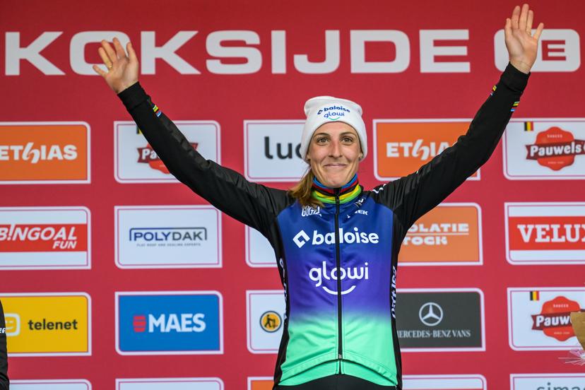 Dutch Lucinda Brand celebrates on the podium after winning the women's elite race of the 6th stage (out of 12) of the world cup cyclocross, in Koksijde Sunday 21 December 2025. BELGA PHOTO DAVID PINTENS