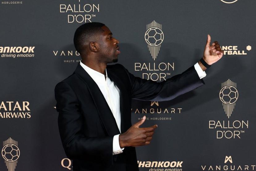 Paris Saint-Germain's French forward Ousmane Dembele poses upon arrival before the 2025 Ballon d'Or France Football award ceremony at the Theatre du Chatelet in Paris on September 22, 2025.  FRANCK FIFE / AFP
