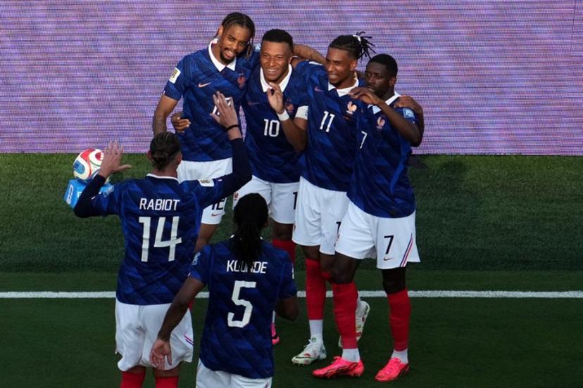 France's forward #10 Kylian Mbappe celebrates scoring his team's third goal with teammates during the 2026 World Cup round of 32 football match between France and Sweden at the New York/New Jersey Stadium in East Rutherford on June 30, 2026.   TIMOTHY A. CLARY / AFP