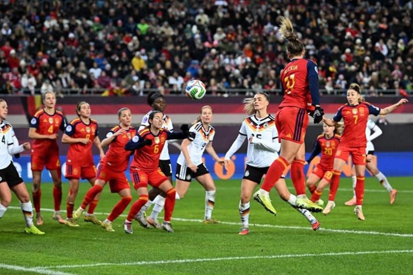 Spain's midfielder #11 Alexia Putellas heads the ball during UEFA Women's Nations League first leg final football match between Germany and Spain in Kaiserslautern, western Germany on November 28, 2025.  THOMAS KIENZLE / AFP