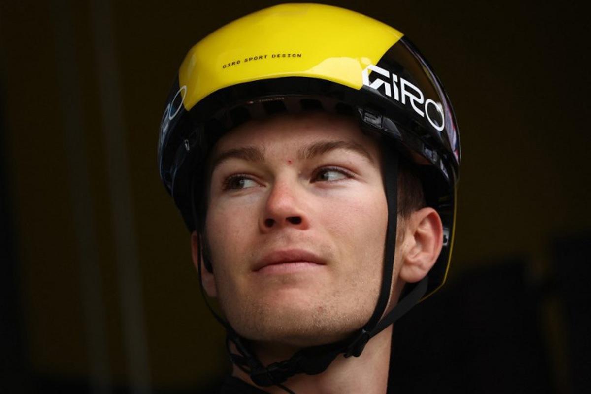 Team Visma-Lease a Bike's French rider Axel Zingle reacts prior to the start of the 5th stage of the Paris-Nice cycling race, 203,3 km between Saint-Just-en-Chevalet and La Côte-Saint-André, on March 13, 2025.  Anne-Christine POUJOULAT / AFP