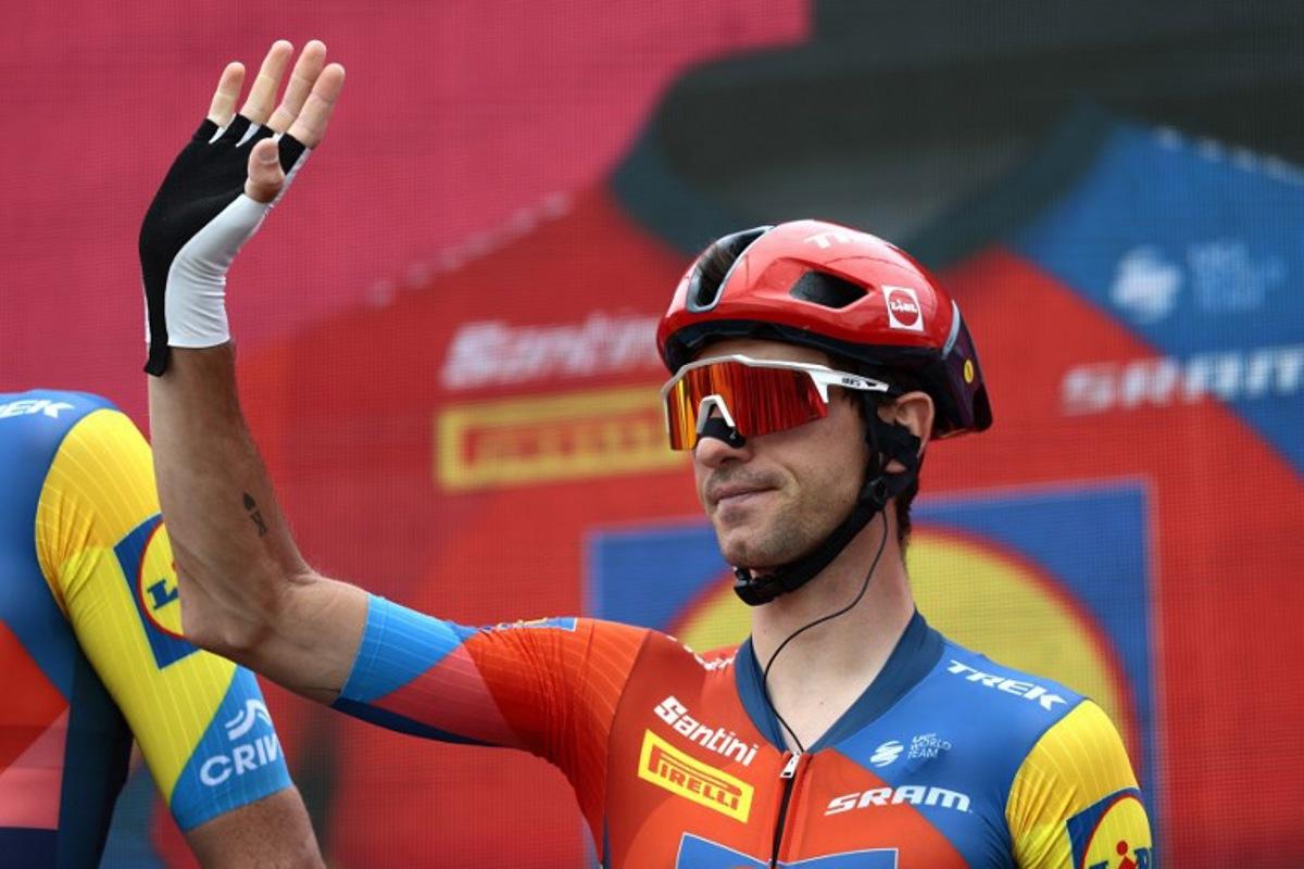Lidl-Trek's Italian rider Giulo Ciccone waves a hand on stage prior to the first stage of the 108th Giro d'Italia cycling race, 160km from Durres to Tirana in Albania, on May 9, 2025.  Luca Bettini / AFP