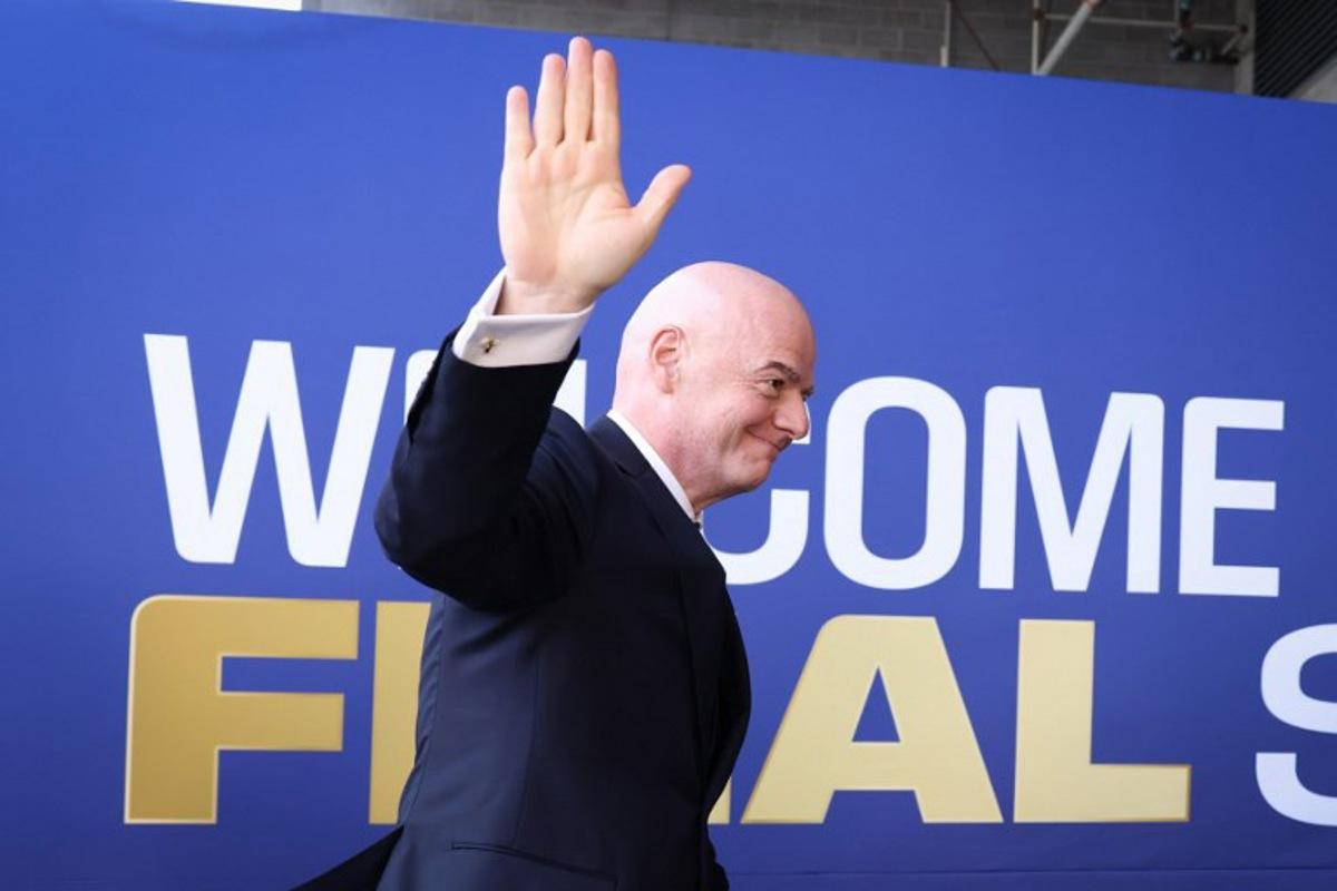 FIFA President Gianni Infantino waves as he arrives for the 2026 World Cup football tournament final match between Spain and Argentina at the New York/New Jersey Stadium in East Rutherford on July 19, 2026.   CHARLY TRIBALLEAU / AFP
