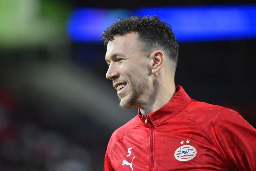 PSV Eindhoven's Croatian forward #05 Ivan Perisic reacts as he warms up ahead of the UEFA Champions League, league phase day 6, football match between PSV Eindhoven (NED) and Atletico Madrid (ESP), at the Philips Stadion, in Eindhoven, south of The Netherlands, on December 9, 2025.  JOHN THYS / AFP