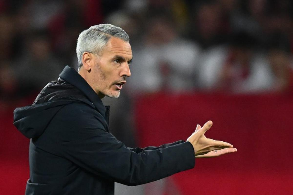 Sporting Braga's Spanish head coach Carlos Vicens reacts during the UEFA Europa League semi-final second leg football match between SC Freiburg and SC Braga in Freiburg im Breisgau, southwestern Germany on May 7, 2026.  Silas STEIN / AFP