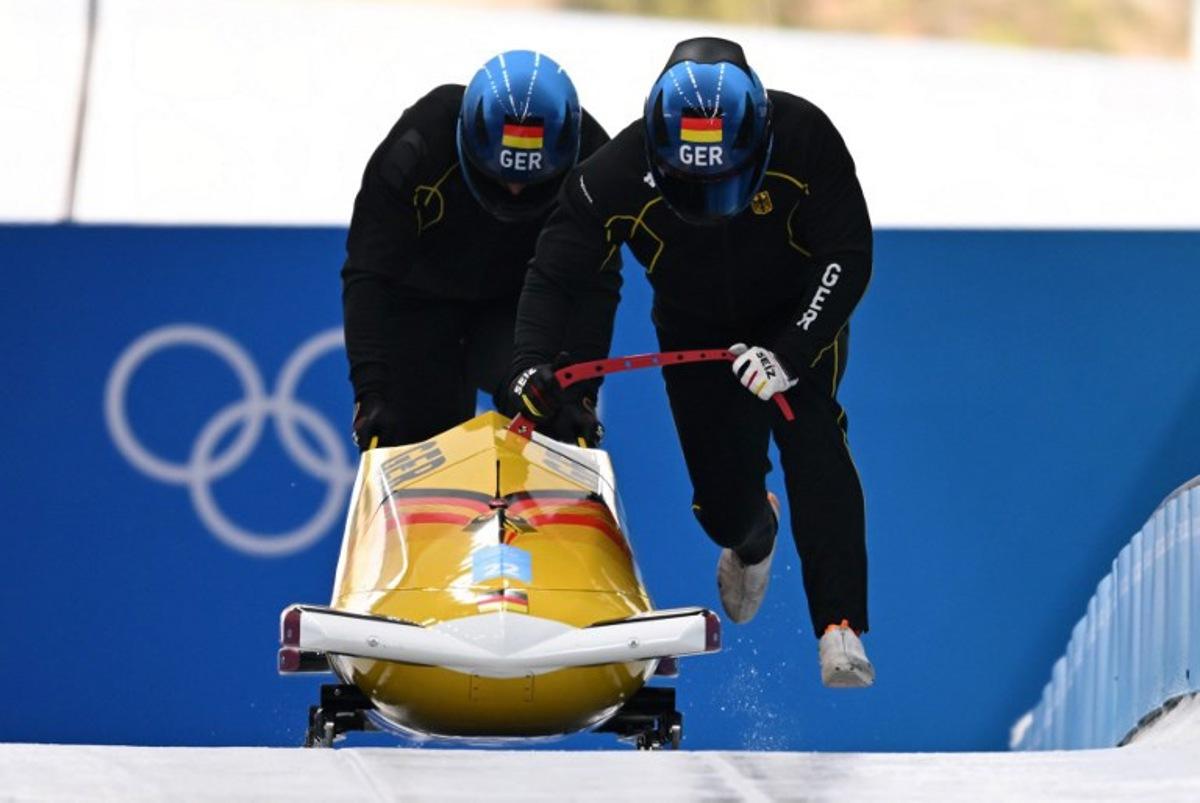 Germany's Francesco Friedrich takes part in the 2-man bobsleigh training at the Yanqing National Sliding Centre during the Beijing 2022 Winter Olympic Games in Yanqing on February 12, 2022.  Daniel MIHAILESCU / AFP