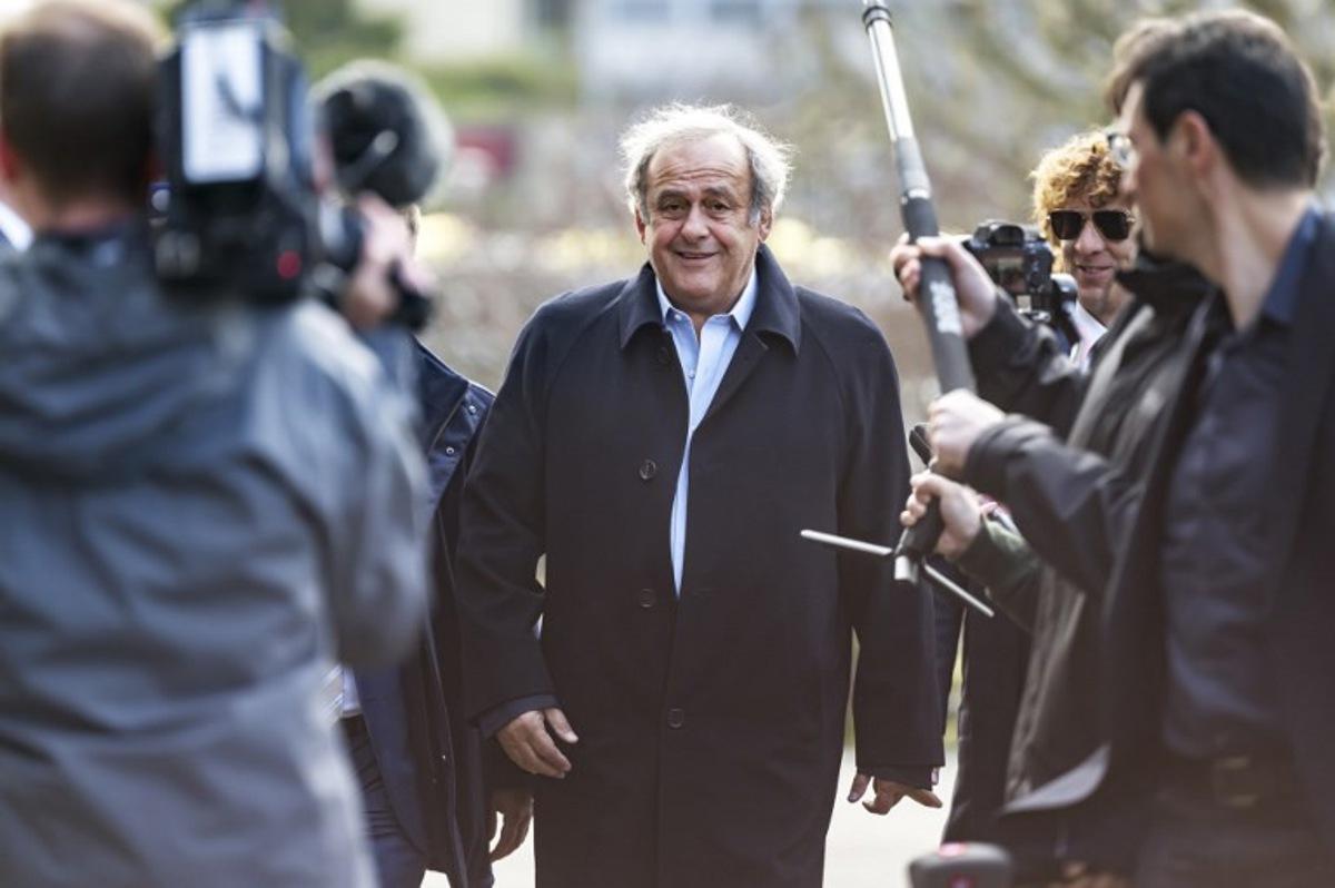 Former UEFA president Michel Platini arrives at the courthouse for the verdict of an appeal by Swiss Attorney General's office against former UEFA and FIFA presidents over a suspected fraudulent payment, in Muttenz near Basel, on March 25, 2025.   Fabrice COFFRINI / AFP