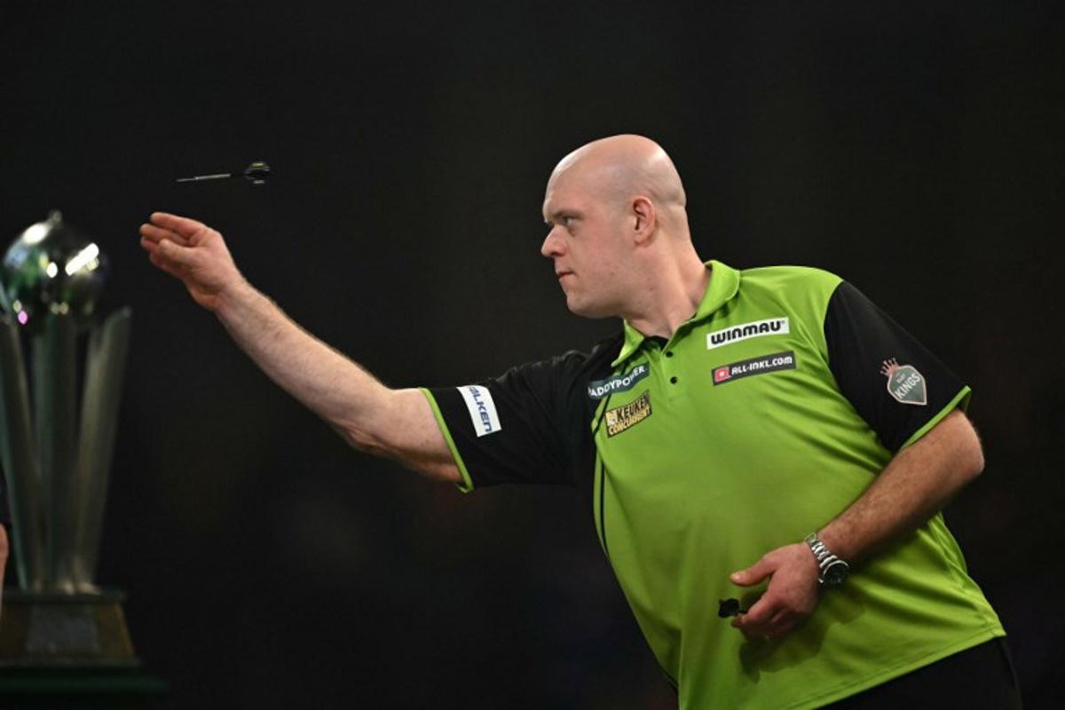 Netherlands' Michael van Gerwen plays against England's Luke Littler during the PDC World Darts Championship final, at Alexandra Palace in London on January 3, 2025.  Ben STANSALL / AFP