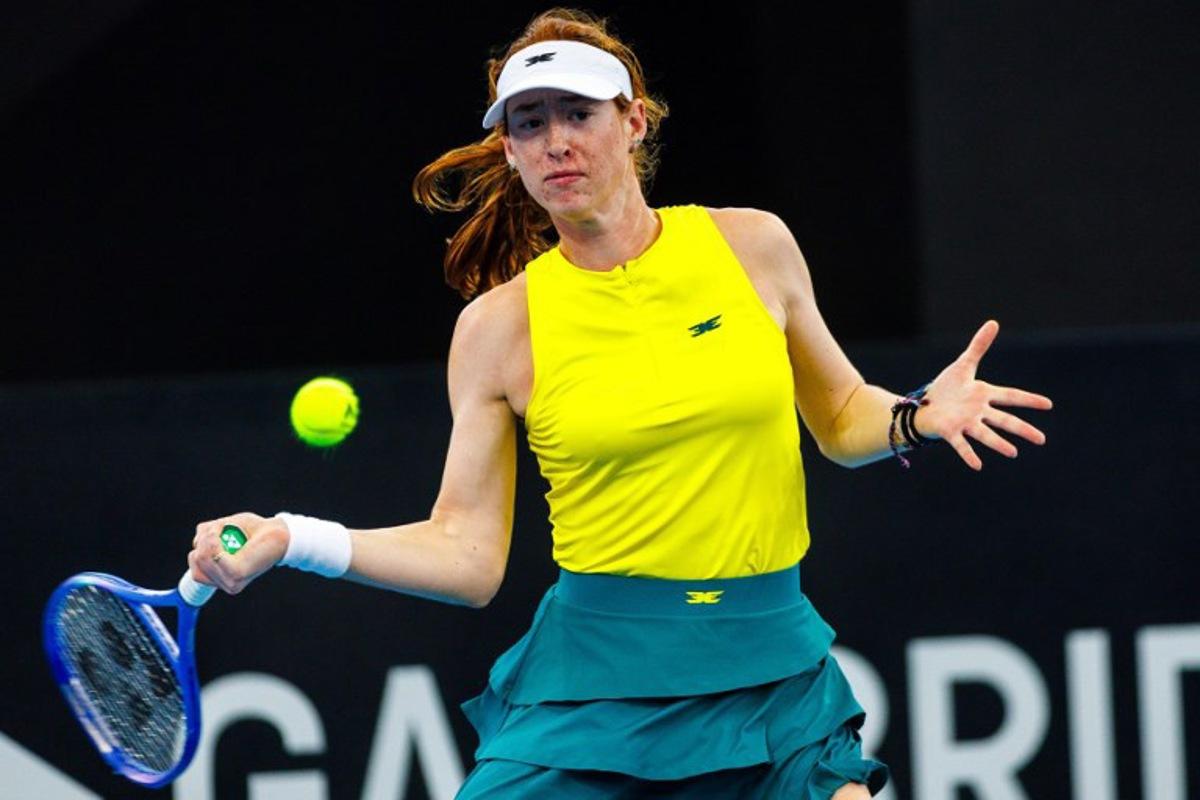 Australia's Maya Joint hits a return against Colombia's Yuliana Monroy during their women's singles match at the Billie Jean King Cup in Brisbane on April 12, 2025.  Patrick HAMILTON / AFP