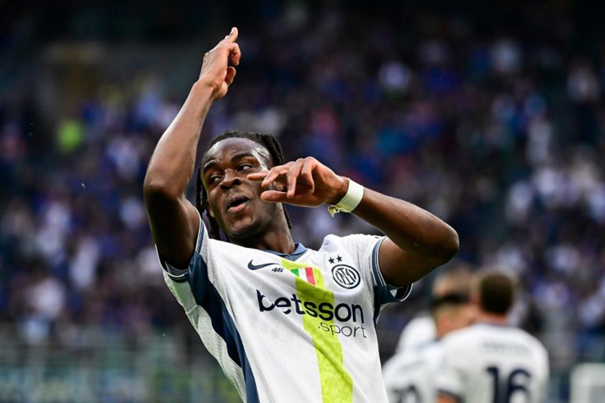 Inter Milan's German defender #31 Yann Bisseck celebrates after scoring his team's third goal during the Italian Serie A football match between Inter Milan and Cagliari at San Siro stadium in Milan, Italy on April 12, 2025.  Piero CRUCIATTI / AFP