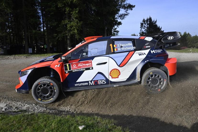 Thierry Neuville of Belgium and his co-driver Martijn Wydaeghe of Belgium compete in their Hyundai i20 compete during the SS12 stage of the World Rally Championship (WRC) Rally of Portugal in Vieira do Minho, on May 17, 2025.   MIGUEL RIOPA / AFP