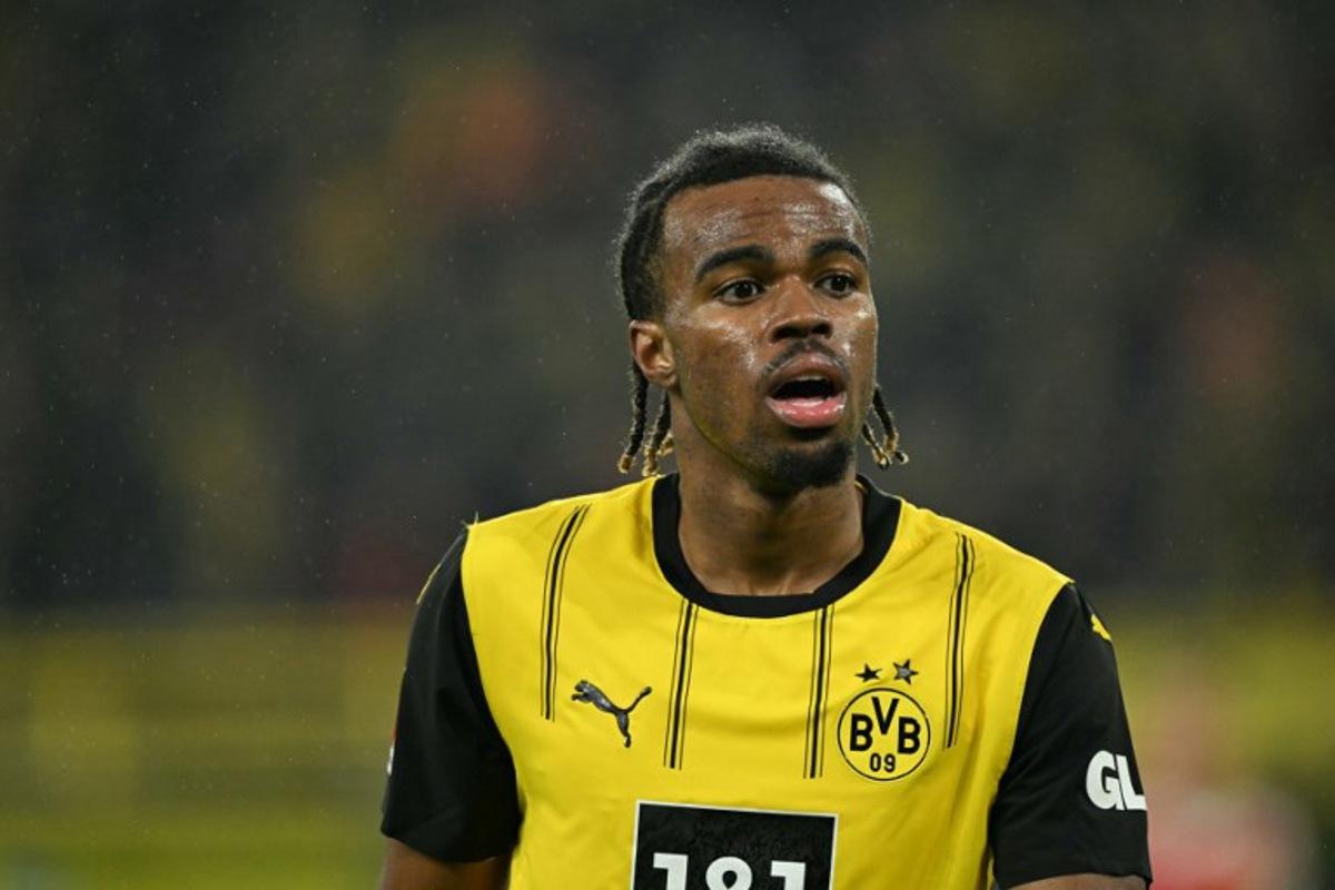 Dortmund's English midfielder #17 Carney Chukwuemeka reacts during the German first division Bundesliga football match between  BVB Borussia Dortmund and 1 FC Union Berlin in Dortmund, western Germany, on February 22, 2025.  INA FASSBENDER / AFP