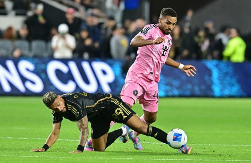 LAFC's French forward #99 Denis Bouanga and Inter Miami's Italian defender #42 Yannick Bright vie for the ball during the Concacaf Champions Cup quarter-final first-leg football match between Los Angeles Football Club (LAFC) and Inter Miami at BMO Stadium in Los Angeles on April 2, 2025.  Frederic J. Brown / AFP