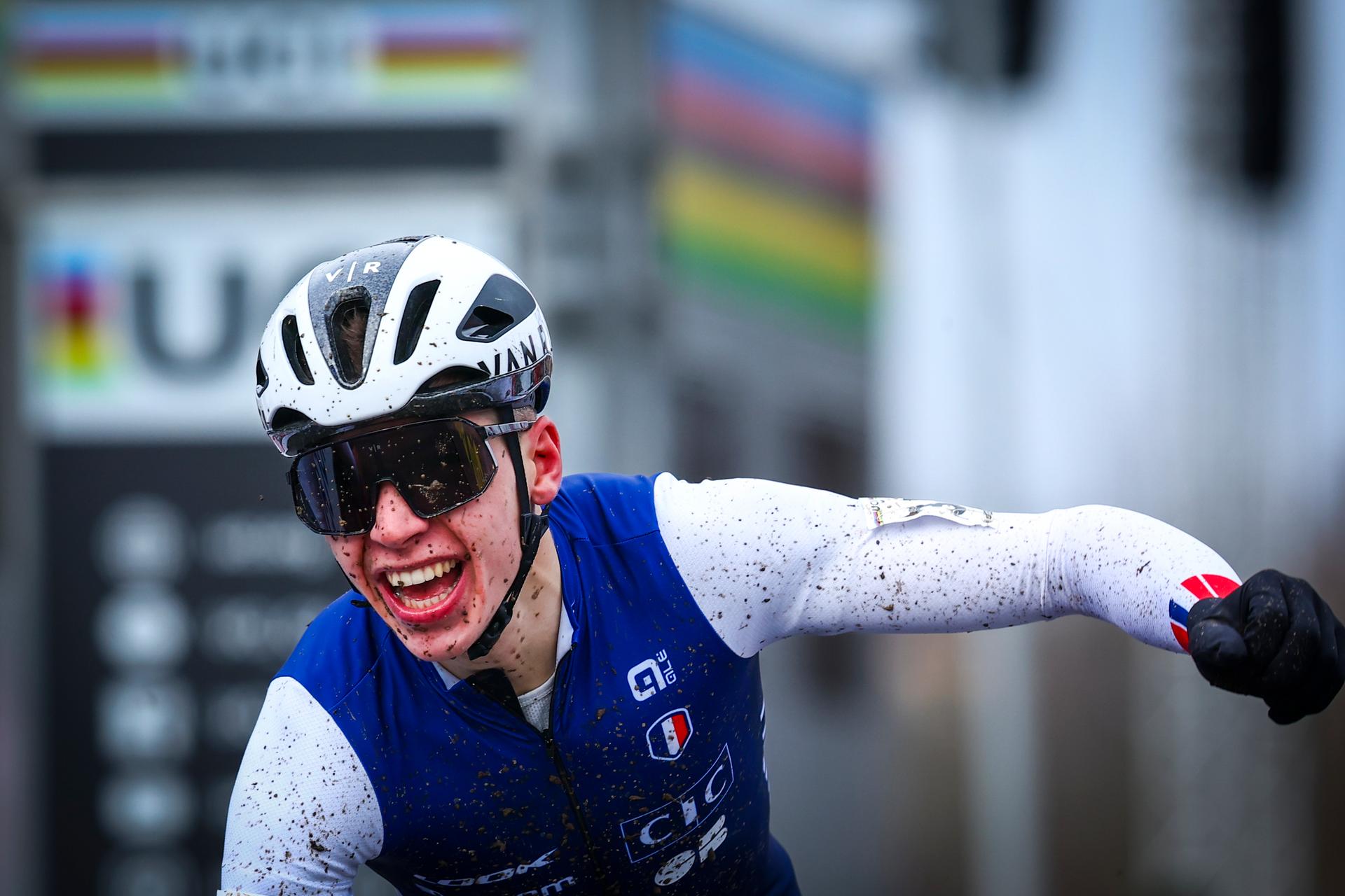 French Aubin Sparfel celebrates as he crosses the finish line to win the team relay event of the Cyclocross World Championships on Friday 02 February 2024 in Tabor, Czech Republic. BELGA PHOTO DAVID PINTENS