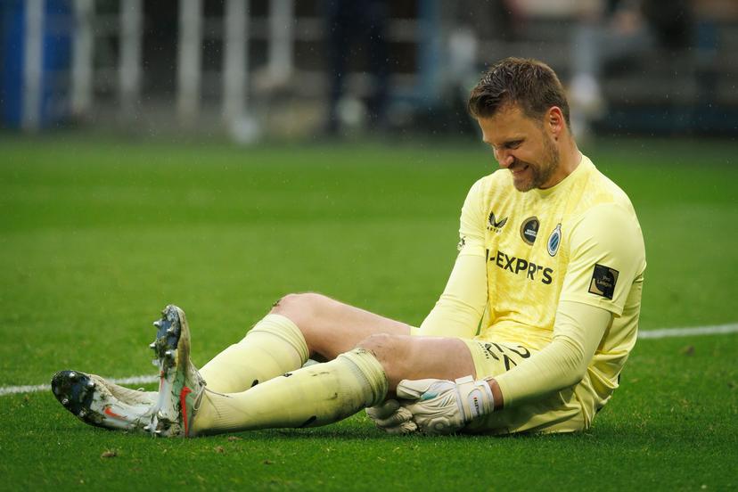 Club's goalkeeper Simon Mignolet lies injured on the ground during a soccer match between KAA Gent and Club Brugge, Sunday 20 April 2025 in Gent, on day 4 (out of 10) of the Champions' Play-offs of the 2024-2025 'Jupiler Pro League' first division of the Belgian championship. BELGA PHOTO KURT DESPLENTER