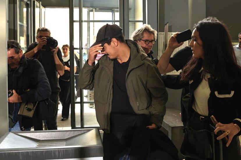 French football player Wissam Ben Yedder (C) arrives at the courthouse of Nice for his trial, in Nice, southeastern France, on October 15, 2024. Former AS Monaco star and French national team forward Wissam Ben Yedder, now without a club and struggling with alcohol problems, stands trial on October 15, 2024, afternoon in Nice on charges of sexual assault, resisting arrest and drink-driving. Valery HACHE / AFP