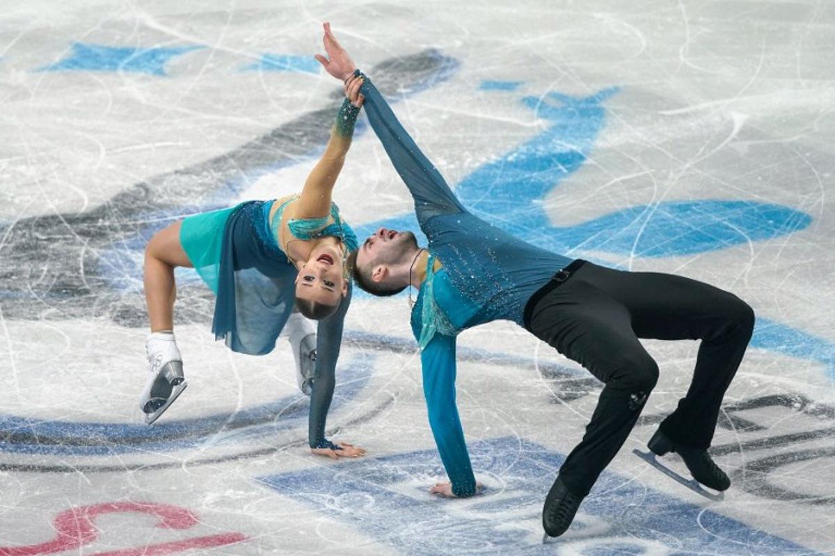 Georgia's Anastasiia Metelkina and Luka Berulava perform during day three of the ISU Figure Ice Skating European Championships in Sheffield, northern England on January 15, 2026.  Ian HODGSON / AFP