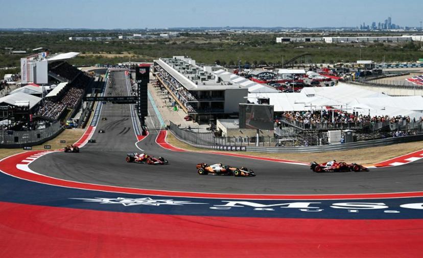 (From R/L) Ferrari's Monegasque driver Charles Leclerc races ahead of McLaren's British driver Lando Norris and Ferrari's British driver Lewis Hamilton during the United States Formula One Grand Prix at the Circuit of the Americas in Austin, Texas, on October 19, 2025.  RONALDO SCHEMIDT / AFP