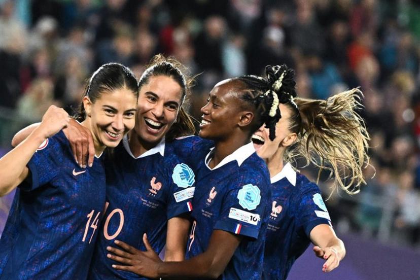 France's midfielder #10 Amel Majri (2ndL) celebrates after scoring the third goal of the match with France's forward #14 Clara Mateo and France's forward #09 Melvine Malard during the UEFA Women's Euro 2025 Group D football match between France and Wales at the Arena St.Gallen in St. Gallen on July 9, 2025.  SEBASTIEN BOZON / AFP