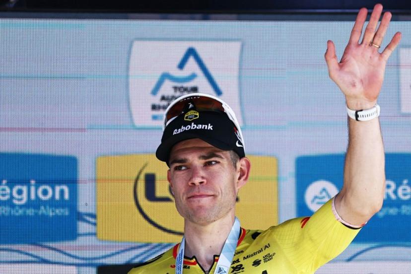 Stage winner Team Visma | Lease a Bike's Belgian rider Wout Van Aert celebrates on the podium of the 5th stage of the Tour Auvergne-Rhone-Alpes cycling race (formerly known as the Criterium du Dauphine), 195,8km between Saint-Chamond and Villars-les-Dombes, central France, on June 11, 2026.  Anne-Christine POUJOULAT / AFP