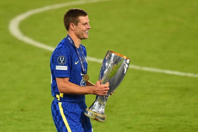 Chelsea's Spanish defender Cesar Azpilicueta collects the trophy during the presentation ceremony after Chelsea won the UEFA Super Cup football match between Chelsea and Villarreal at Windsor Park in Belfast on August 11, 2021.  Paul ELLIS / AFP