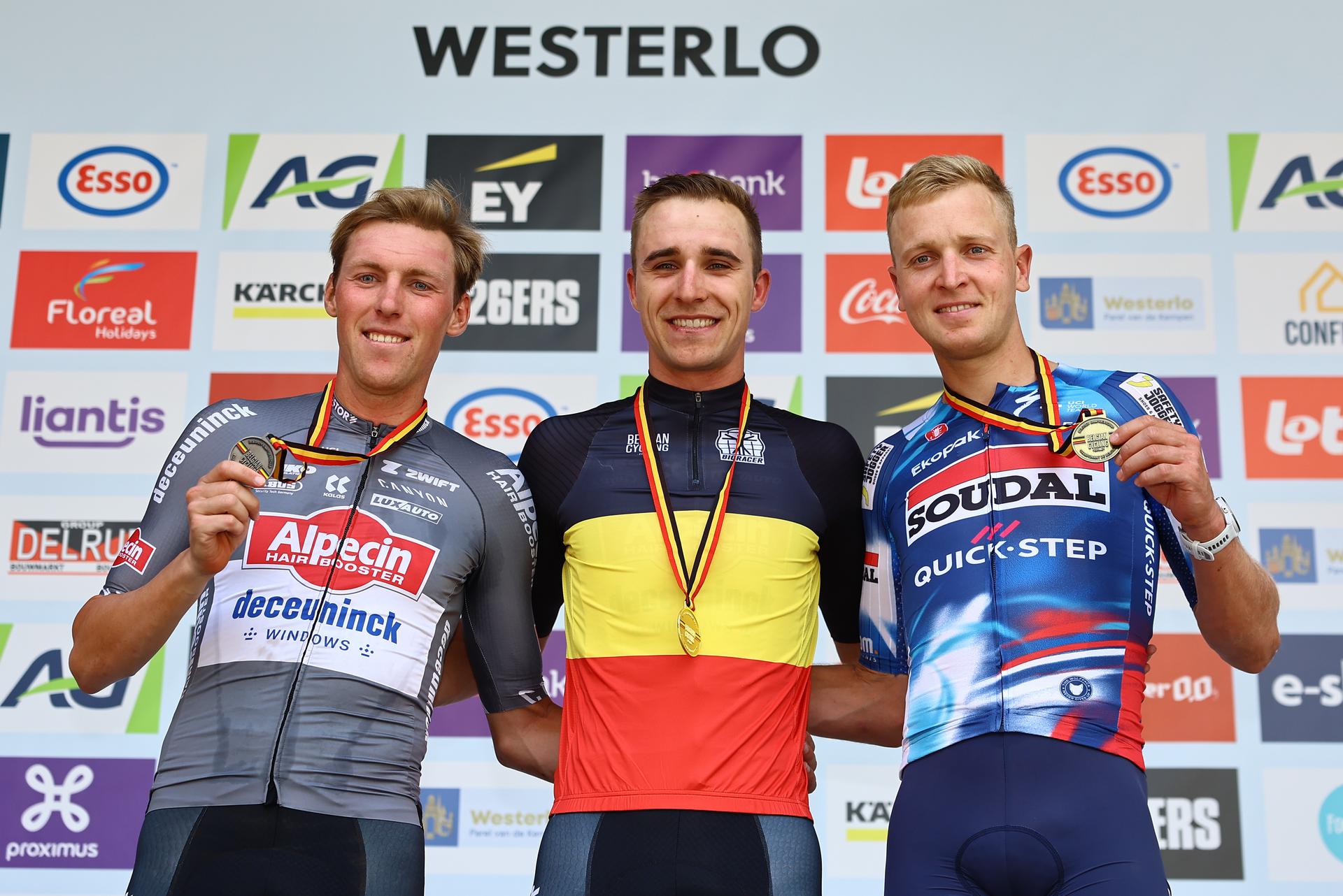 Belgian Timo Kielich  , Belgian Niels Vandeputte and Belgian Tim Merlier   pictured on the podium after the elite race at the Belgian Gravel Championships, Sunday 17 August 2025, in Westerlo. BELGA PHOTO DAVID PINTENS