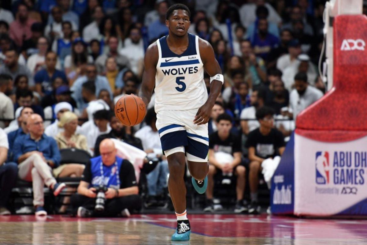 Minnesota Timberwolves' guard Anthony Edwards #5 dribbles the ball during the NBA Preseason game between the Dallas Mavericks and the Minnesota Timberwolves at the Etihad Arena in Abu Dhabi on October 7, 2023.  Ryan LIM / AFP