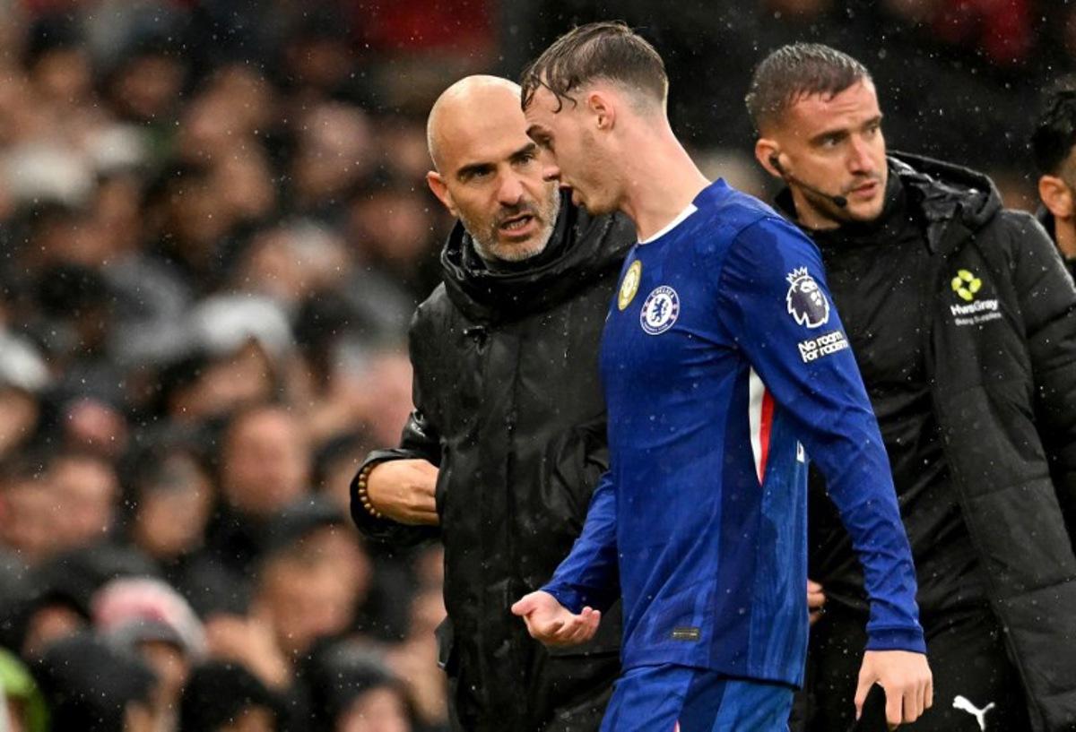 Chelsea's English midfielder #10 Cole Palmer leaves the pitch after being substituted off during the English Premier League football match between Manchester United and Chelsea at Old Trafford in Manchester, north west England, on September 20, 2025.  Oli SCARFF / AFP