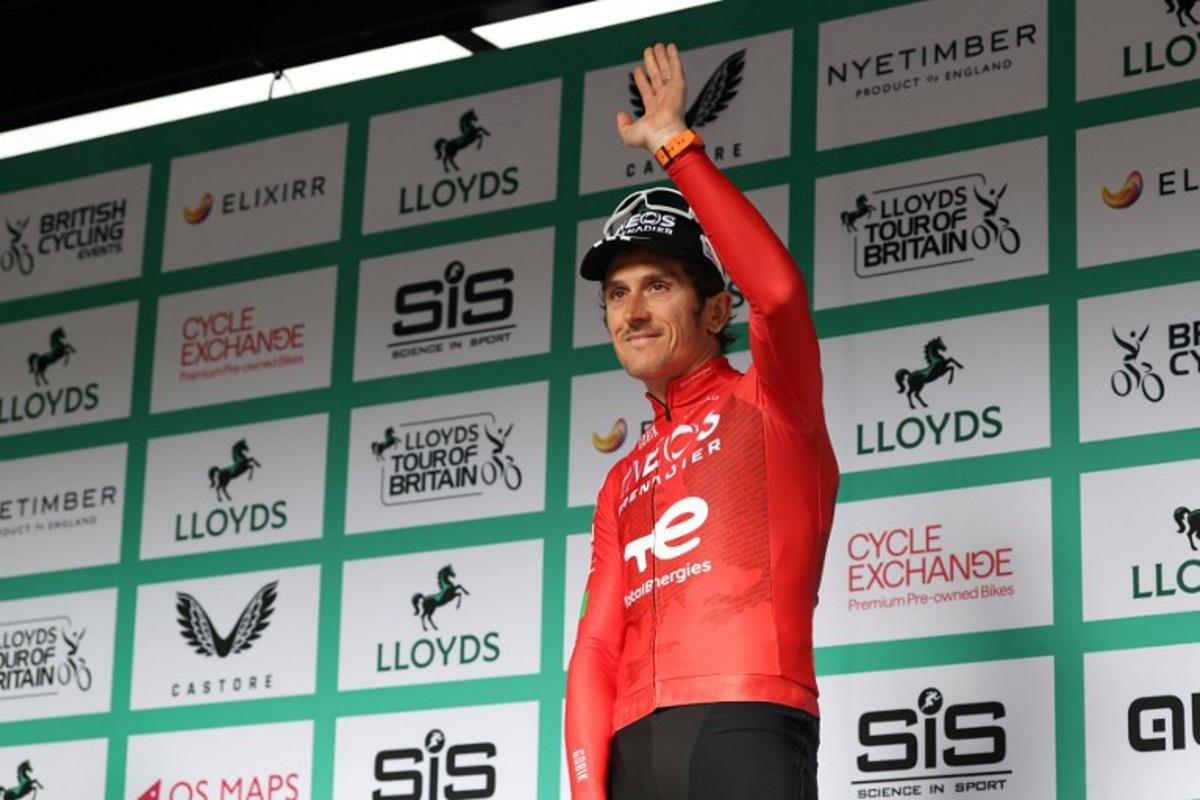 INEOS Grenadiers team's Welsh rider Geraint Thomas waves to the crowd on stage after the sixth stage of the Tour of Britain cycling race, in Cardiff on September 7, 2025, his final race.  Darren Staples / AFP
