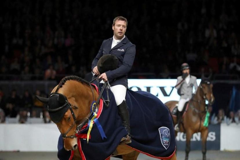 The winner, Great Britain's Robert Whitaker, rides his horse Cash Sent during the FEI World Cup Jumping event at the Gothenburg Horse Show on February 23, 2018 in Sweden.  Adam IHSE / TT NEWS AGENCY / AFP Sweden OUT


