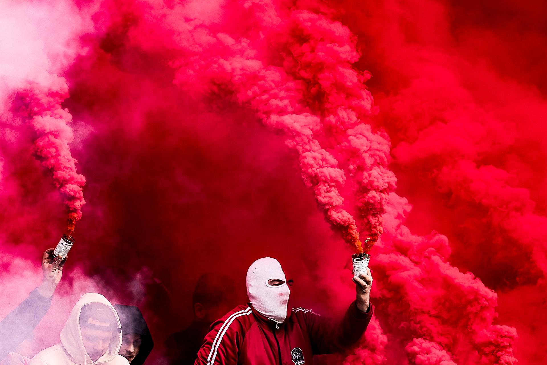 Supporters with fireworks and smoke bombs pictured during a soccer match between Standard de Liege and RSC Anderlecht, Sunday 01 February 2026 in Liege, on day 23 of the 2025-2026 'Jupiler Pro League' first division of the Belgian championship. BELGA PHOTO BRUNO FAHY
