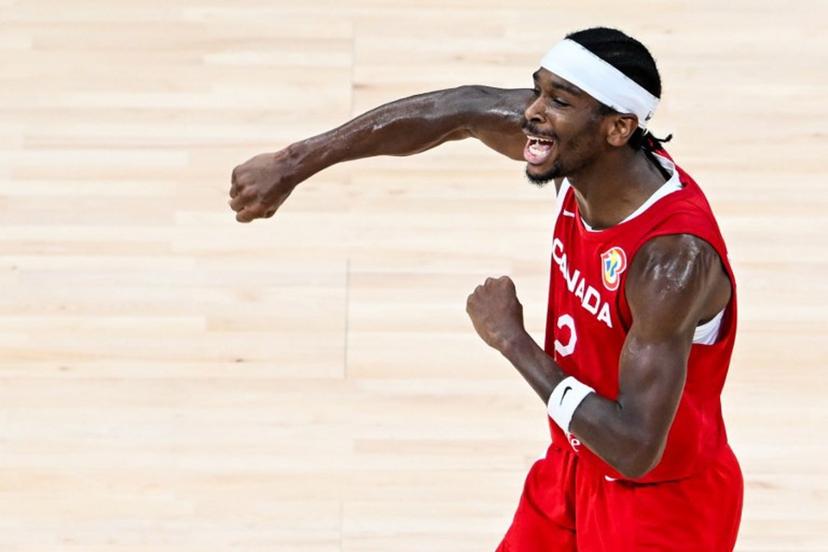 Canada's Shai Gilgeous-Alexander celebrates victory at the end of the FIBA Basketball World Cup game for third place between Canada and USA in Manila on September 10, 2023.  SHERWIN VARDELEON / AFP