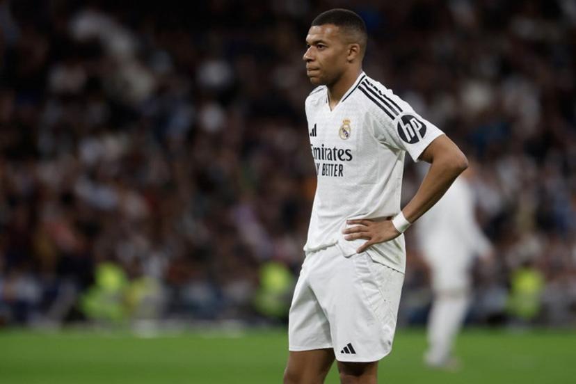 Real Madrid's French forward #09 Kylian Mbappe reacts during the Spanish league football match between Real Madrid CF and RCD Mallorca at the Santiago Bernabeu Stadium in Madrid, on May 14, 2025.  Pierre-Philippe MARCOU / AFP